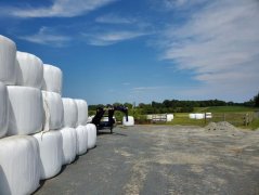 Wrapping Dry Hay Bales with Plastic to Extend Quality
