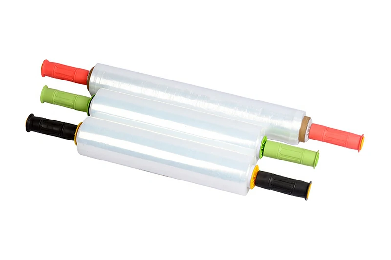 Extended core stretch film rolls with plastic dispenser handles
